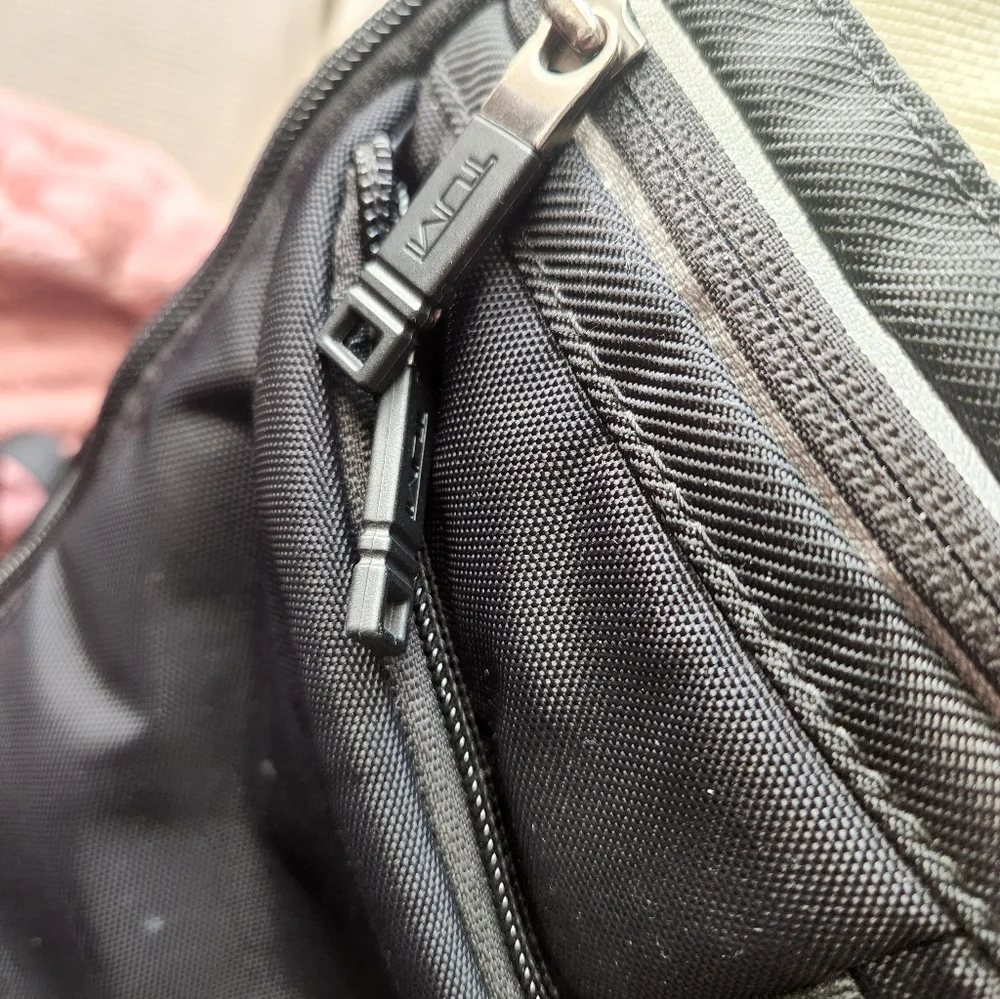 Tumi Black and Cream Backpack